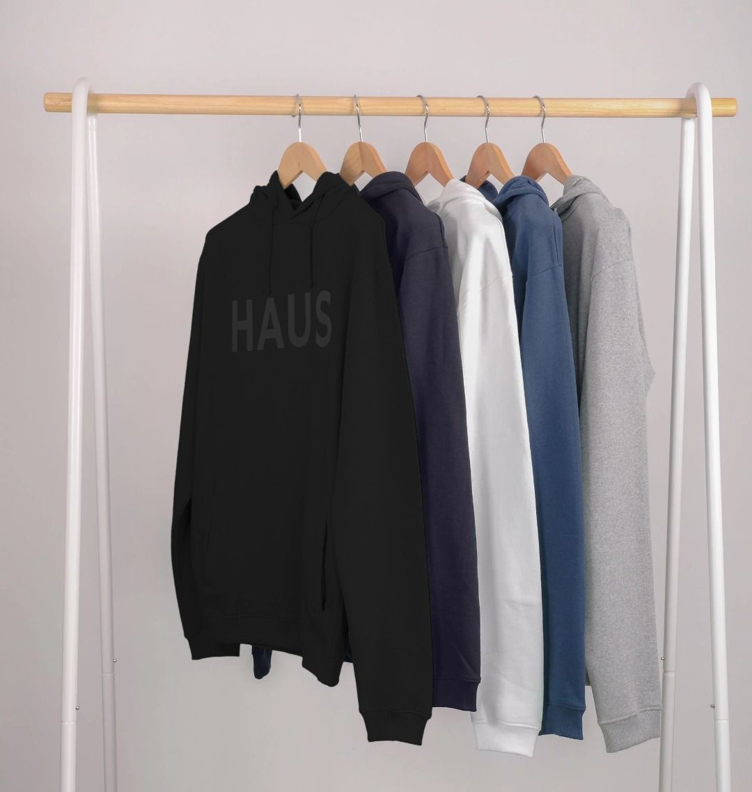 Haus Collection Hoodie colour range on clothes rack